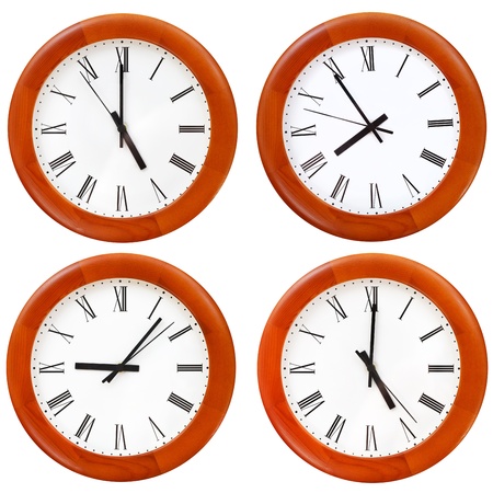 set of wooden round wall dial clock isolated on white backgroundの写真素材