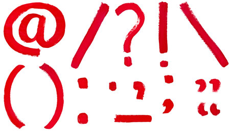 set of punctuation marks hand painted by red brush