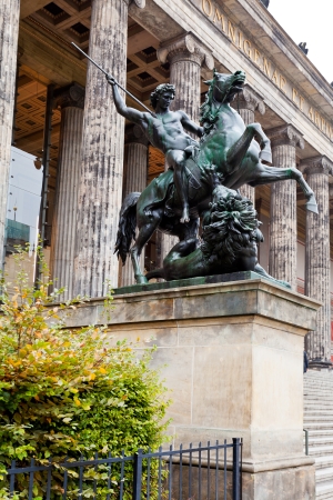 BERLIN, GERMANY - OCTOBER 16: statue Lowenkampfer (Lion-fighter) near Altes Museum (Old Museum) in Berlin, Germany on October 16, 2013. The statue was completed by Albert Wolff in 1861のeditorial素材