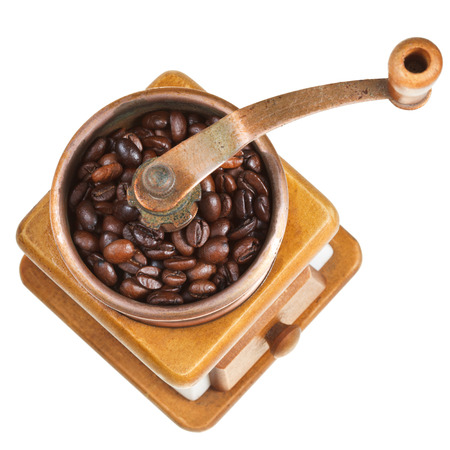 vintage coffee mill isolated on white backgroundの写真素材