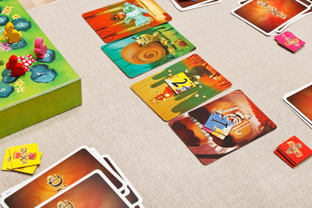 MOSCOW, RUSSIA - FEBRUARY 3, 2014: Dixit card game created by Jean-Louis Roubira in 2008, and published by Libellud. In 2010 the game received prestigious award Spiel des Jahres (Game of the Year)のeditorial素材
