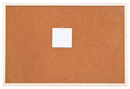 one small sheet of paper on bulletin cork board isolated on white backgroundの写真素材