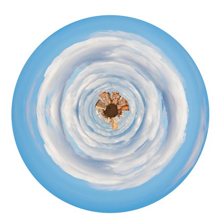 little planet - little urban planet in white autumn clouds isolated on white backgroundの写真素材