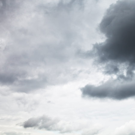 dark grey overcast sky in summer dayの写真素材