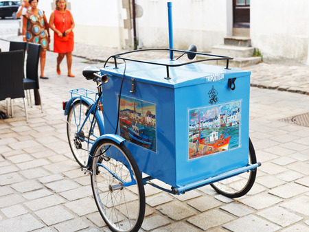 LE CROISIC, FRANCE - JULY 26, 2014: traditional street ice cream trolley on street Rue de la Marine in Le Croisic town, France. Le Croisic is town in western France on Atlantic coastのeditorial素材