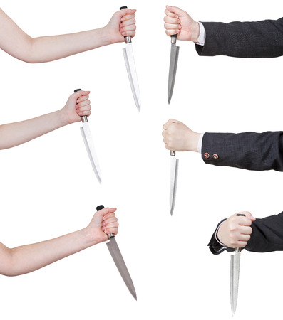 set of hands with knife isolated on white backgroundの写真素材