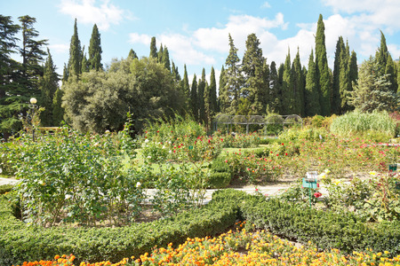 YALTA, RUSSIA - OCTOBER 2, 2014: tourists flower beds in nikitsky botanical garden, Crimea. The garden was founded in 1812 by its first director botanist Christian Stevenのeditorial素材