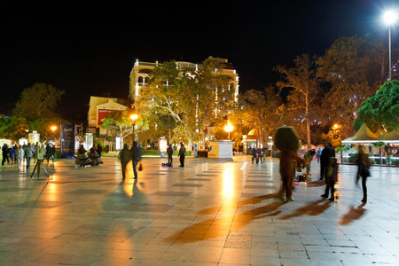 YALTA, RUSSIA - OCTOBER 2, 2014: tourists walking on promenade in Yalta city in night. Yalta is resort city on the north coast of the Black Sea on the Crimean peninsula.のeditorial素材