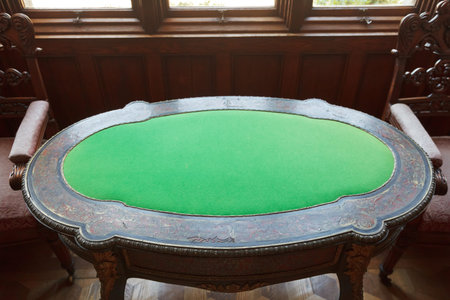 ALUPKA, RUSSIA - SEPTEMBER 28, 2014: interior of Vorontsov (Alupka) Palace in Crimea and card table....