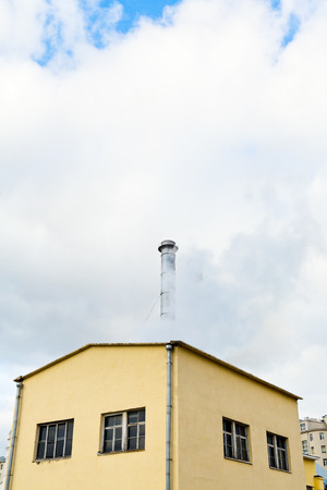 Central heating station and chimney in cold autumn dayのeditorial素材