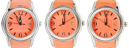 set of orange wristwatches with midnight time isolated on white background
