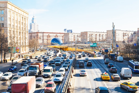 MOSCOW, RUSSIA - MARCH 27, 2015: urban traffic on Leningradskoye shosse in spring day. Leningrad highway - one of Moscow's busiest highway, connects the center of Moscow with Sheremetyevo Airportのeditorial素材