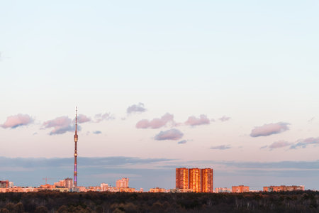 TV tower and urban buildings in pink spring sunset, Moscowの写真素材
