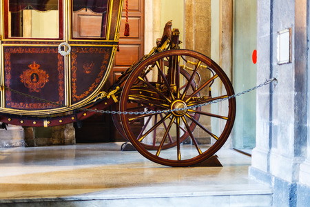 CATANIA, ITALY - APRIL 5, 2015: wooden coach in Town Hall of Catania. This carriage is used for the urban Festivals, such as of the feast of St. Agatha in Catania, Sicilyのeditorial素材