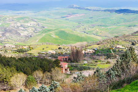 outskirts of Aidone town in green sicilian hills in spring, Italyの写真素材