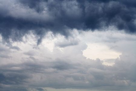 dark rain clouds in the spring sky