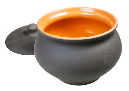 open ceramic pot from black unglazed clay and lid isolated on white backgroundの写真素材