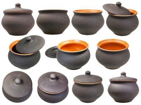 set of ceramic pots from black unglazed clay isolated on white backgroundの写真素材