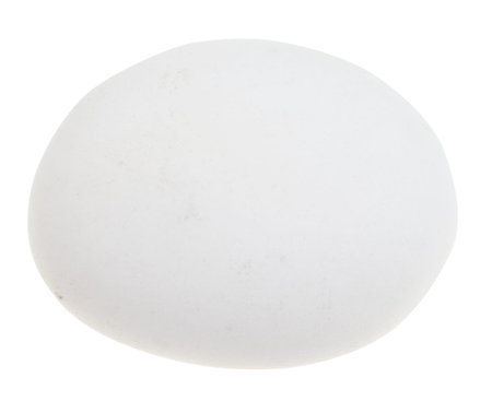 macro shooting of natural mineral stone - tumbled cacholong (white opal) gemstone isolated on white...