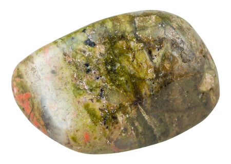 macro shooting of natural mineral stone - polished pebble of unakite (epidosite) gemstone isolated on white backgroundの写真素材