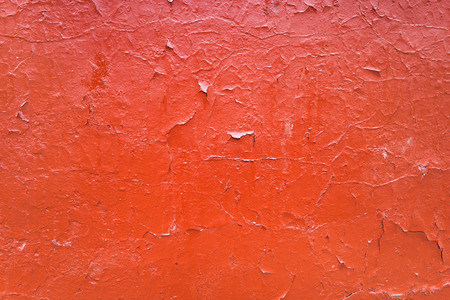 stone background - red painted shabby wallの写真素材