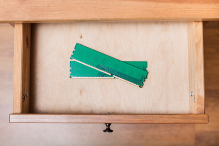 top view of Computer Memory planks in open drawer of nightstandの写真素材