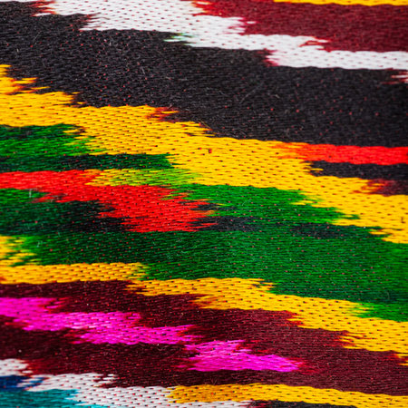 textile square background - traditional central asian striped ornament of cloth