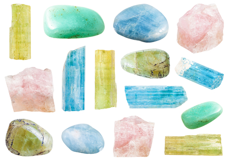 set of various beryl mineral crystals and polished gemstones (heliodor, beryl, aquamarine, vorobievite, morganite, etc) isolated on white backgroundの写真素材