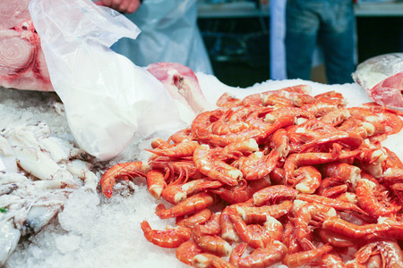 travel to Italy - shrimps on ice in market in Venice cityの写真素材
