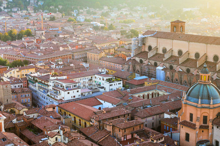 travel to Italy - above view of apartment buildinds in Bologna town from Torre Asinelli ( Asinelli Tower) at sunsetの写真素材