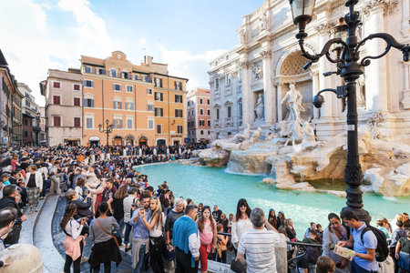 ROME, ITALY - NOVEMBER 1, 2016: crowd of tourists and Trevi Fountain in Rome city. It is it is the largest Baroque fountain in the Rome and one of the most famous fountains in the world.のeditorial素材