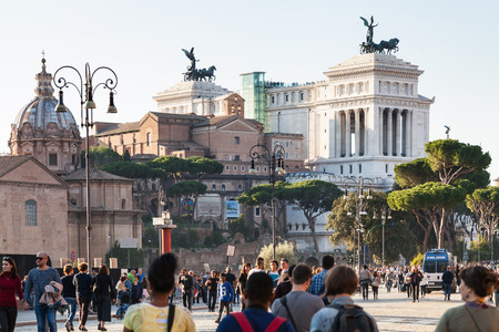 ROME, ITALY - OCTOBER 31, 2016: tourists on Via dei Fori Imperiali. It is road in the centre of Rome city that runs in a straight line from the Piazza Venezia to the Colosseumのeditorial素材
