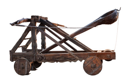 ancient wooden catapult isolated on white background