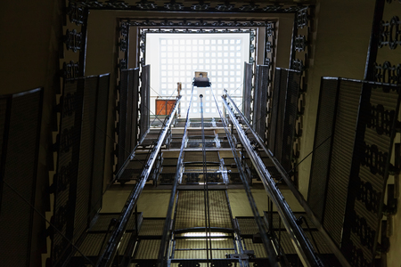 lift shaft in old multi-storey building in Romeの写真素材