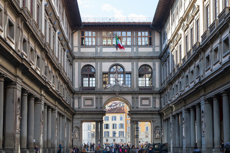 FLORENCE, ITALY - NOVEMBER 6, 2016: people on yard Uffizi Gallery. Uffizi Gallery is one of the oldest museums in Europe, its origin refers to 1560, when Vasari designed large palace with two wingsのeditorial素材