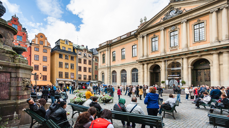 STOCKHOLM, SWEDEN - SEPTEMBER 8, 2011: tourists near Swedish Academy on Stortorget square in Stockholm city. Academy Committees select international science prizes winners, including Nobel Prizeのeditorial素材