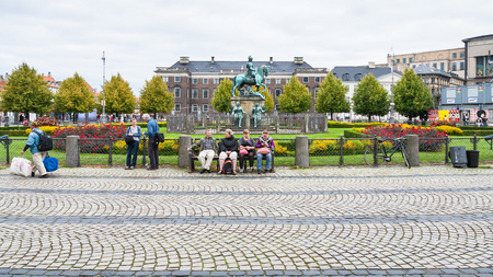 COPENHAGEN, DENMARK - SEPTEMBER10, 2011: Kongens Nytorv (King's New Square) with statue King Christian V in Copenhagen city in autumn day. Kongens Nytorv is public square at the end of street Strogetのeditorial素材