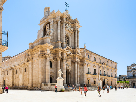 SYRACUSE, ITALY - JULY 3, 2011: people near Cathedral on piazza Duomo in Syracuse city in Sicily. The city is a historic town in Sicily, the capital of the province of Syracuse.のeditorial素材