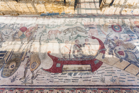 PIAZZA ARMERINA, ITALY - JUNE 29, 2011: Great Hunt mosaic on floor of Villa Romana del Casale. This ancient villa was built in the 4th century and located near Piazza Armerina town in Sicilyのeditorial素材