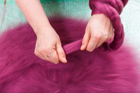 workshop of manufacturing of felt for beret in wet felting process - arranging of the second layer of wool fibers on hat layoutの写真素材