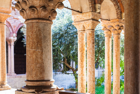 VERONA, ITALY - MARCH 27, 2017: columns of cloister of Basilica di San Zeno (San Zeno Maggiore, San Zenone) in Verona city. Church was built over the burial place of Veronese bishop San Zenoのeditorial素材