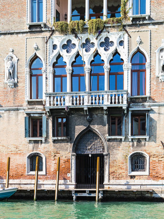VENICE, ITALY - MARCH 30, 2017: facade of palace Loredan dell'Ambasciatore on Grand Canal in Venice city in spring. Palazzo Loredan dell'Ambasciatore is a late 15th-century Gothic palace in Veniceのeditorial素材