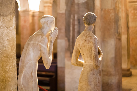 VERONA, ITALY - MARCH 27, 2017: sculptures in lower church of Chiesa di San Fermo Maggiore in Verona city. This medieval church hold relics of saints Fermo and Rusticoのeditorial素材