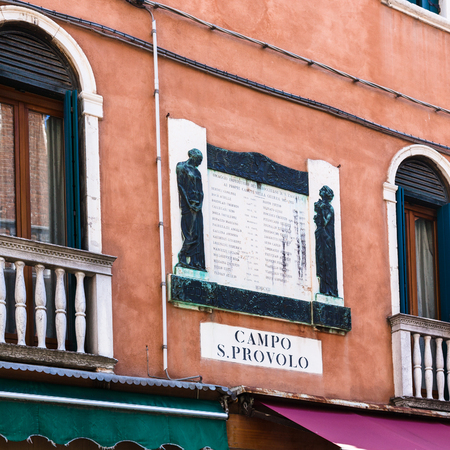 VENICE, ITALY - MARCH 30, 2017: memorial plate on wall of urban house on Campo San Provolo in Venice. The sign was made in memory of the victims of the warのeditorial素材
