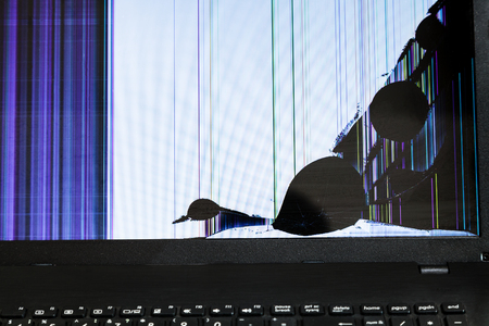 lines and spots on broken LCD screen of laptopの写真素材