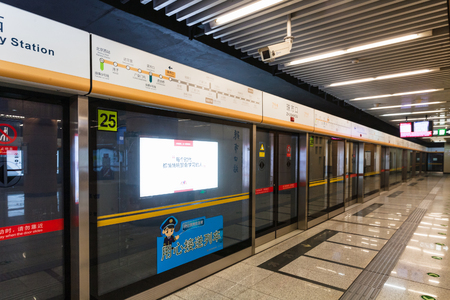 BEIJING, CHINA - MARCH 19, 2017: subway car on Zhushikou station of Beijing underground. The urban rail network has 19 lines, 345 stations and 574 km of track in operationのeditorial素材