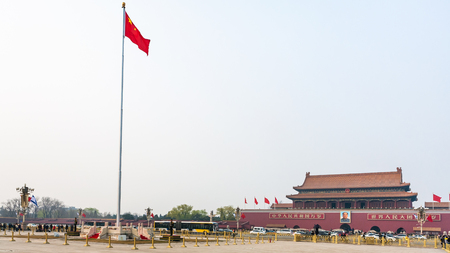 BEIJING, CHINA - MARCH 19, 2017: panorama of Tiananmen Square with guard of honor near the State Flag, tourists and The Tiananmen monument (Gate of Heavenly Peace) on in spring.のeditorial素材