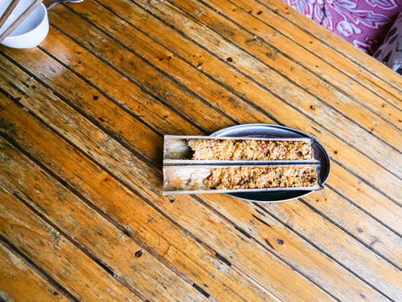 travel to China - above view of fried rice in bamboo trunk in rustic eatery in area Dazhai Longsheng Rice Terraces (Dragon's Backbone terrace, Longji Rice Terraces) country in springの写真素材