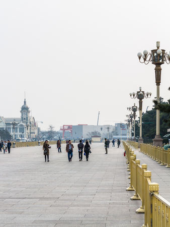 BEIJING, CHINA - MARCH 19, 2017: tourists and view Zhengyangmen East Railway Station, part of the China Railway Museum on Tiananmen Square in spring. Tiananmen Square is central city square in Beijingのeditorial素材