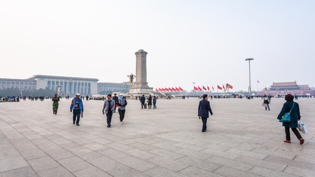 BEIJING, CHINA - MARCH 19, 2017: panorama of Tiananmen Square with people, Monument to the People's Heroes and Great hall of The people in spring. Tiananmen Square is central city square in Beijingのeditorial素材